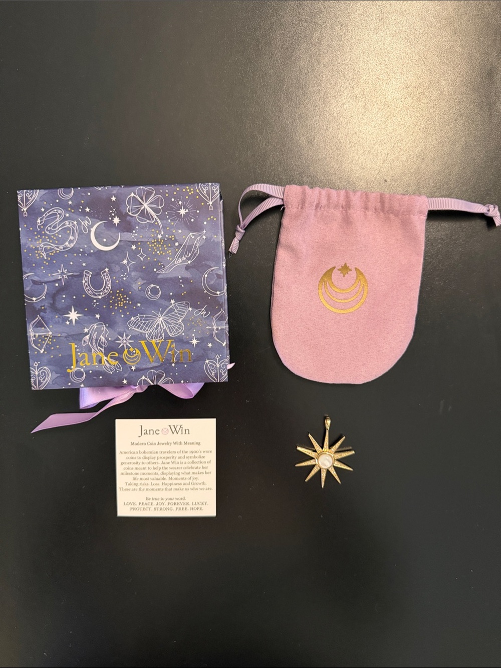 Jane Win LUCKY Supernova Pendant with mother of pearl.